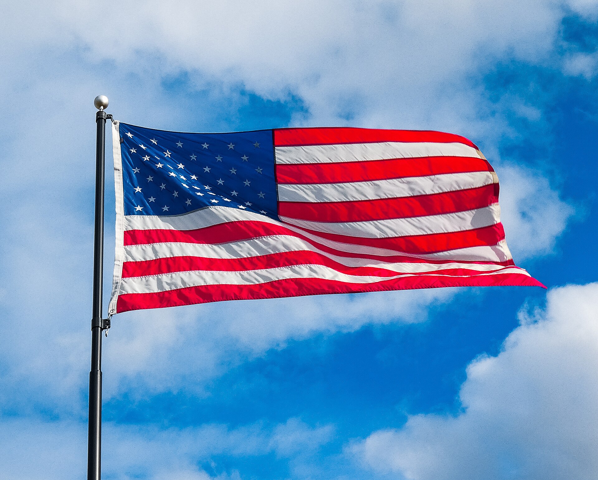 The flag of the United States waving